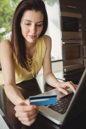 Beautiful woman shopping online Beautiful woman shopping online