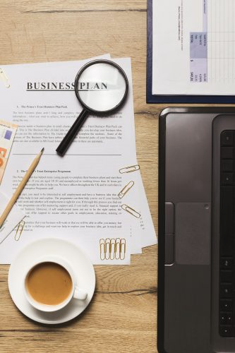 Flat lay of business plan and accountancy concept. Top view
